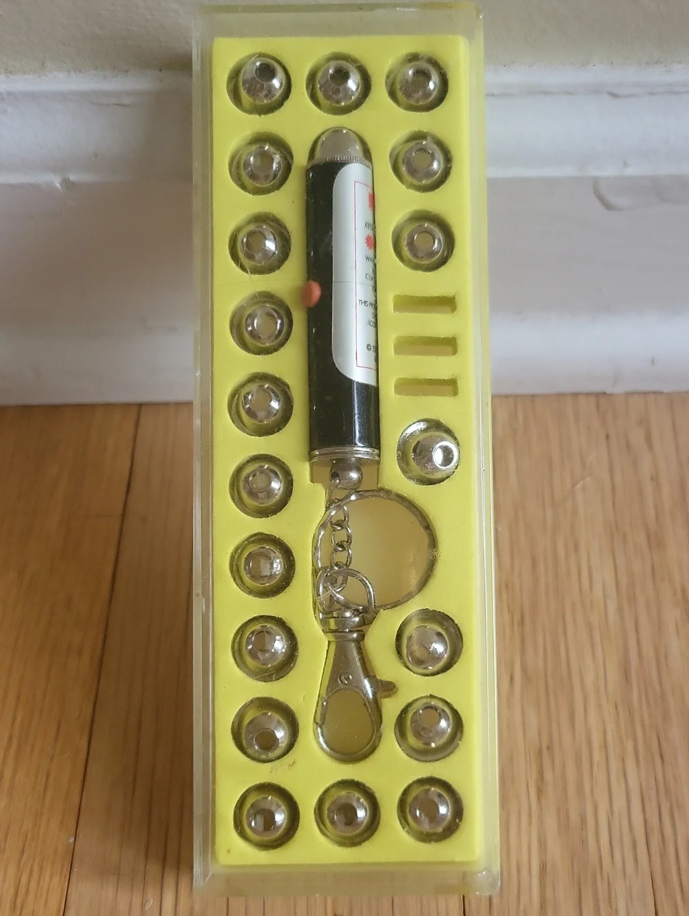 Source Unknown Cat Toy Laser Keychain with Yellow Tray